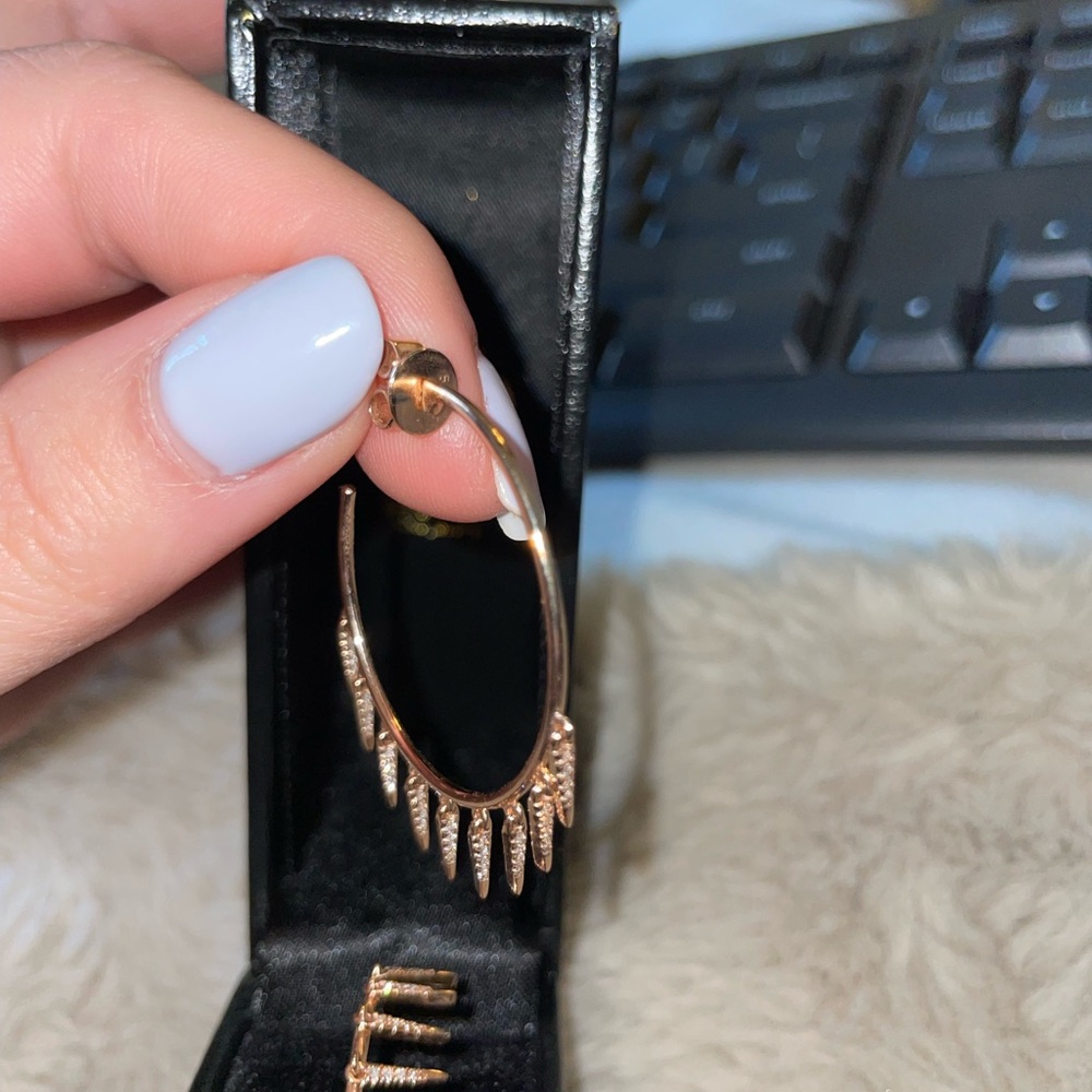 PK Hart 14 carat rose gold hoops with real diamonds.